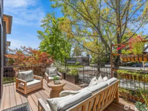 Step out onto the main-level exterior deck patio, complete with a built-in gas hookup—ideal for effortless outdoor grilling.