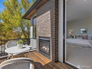 Step into your private exterior cedar deck with a brick hearth.