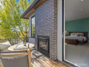 Step into your private exterior cedar deck with a brick hearth.