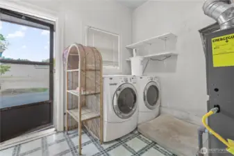 Laundry room washer and dryer included newer gas furnace.