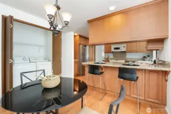 Side by side laundry with shelving