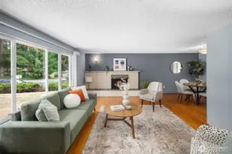 Expansive picture windows bring in tons of natural light. This home is fabulous for entertaining!