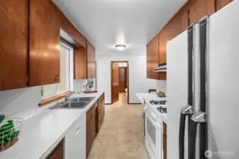 Gas cooking and a window out to the backyard! Both are a bonus!