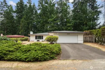 A new roof with transferable warranty in 2022 and a newer garage door! Many updates already complete.