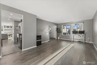 This large great room can serve as a home office, an additional living room, or whatever your heart desires!