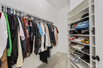 Walk in closet in the Primary Suite.