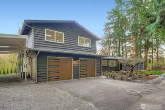New garage doors, carport 10' height.