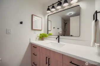 Shared hall bathroom on main floor.