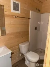 Bathroom with corner shower