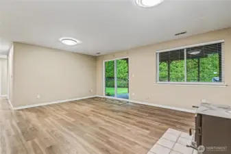 Downstairs sliding glass doors to the backyard.