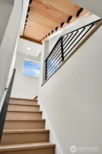 the lower level entry is bathed in light from the main level