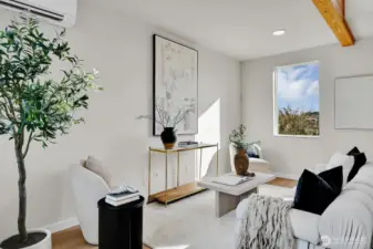 the open main floor level's living area affords Mt Rainier views and plenty of light.