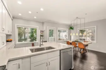 Entertain in this beautifully updated kitchen with adjacent dining room and deck