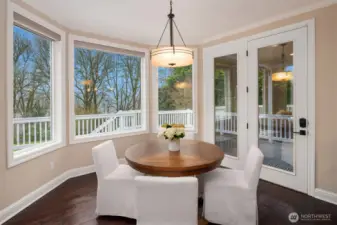 French doors out to expansive deck, great for hosting barbeques