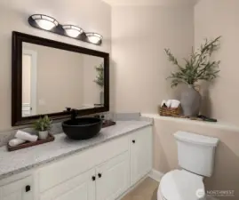 Main level 1/2 bath with plenty of storage