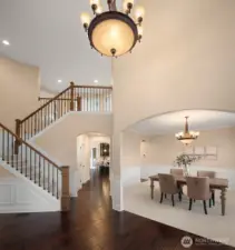 Beautiful staircase to second level, new carpet throughout