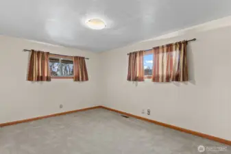 guest bedroom located on the main floor