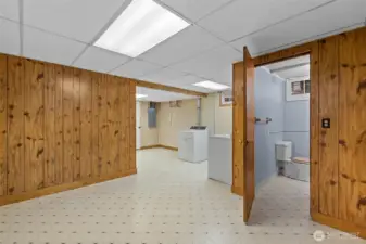 Exterior door just past the laundry in the storage room