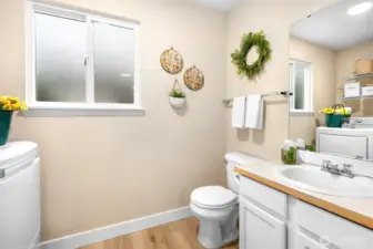 Half bathroom and laundry room on main level